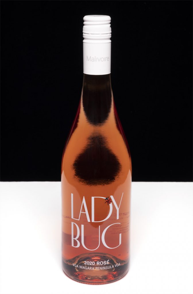 editorial product photography of Malivoire Lady Bug Wine bottle